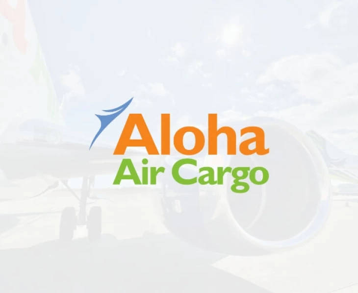 An Aloha Air Cargo logo with a plane engine in the background.
