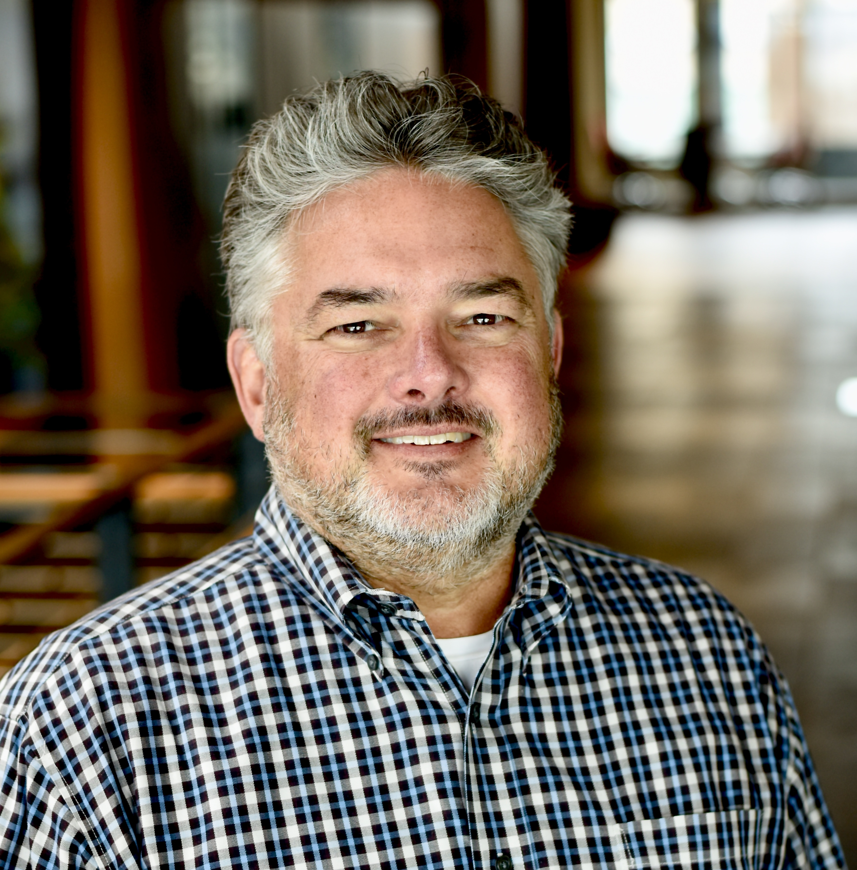 Corporate headshot of John Greenlee.