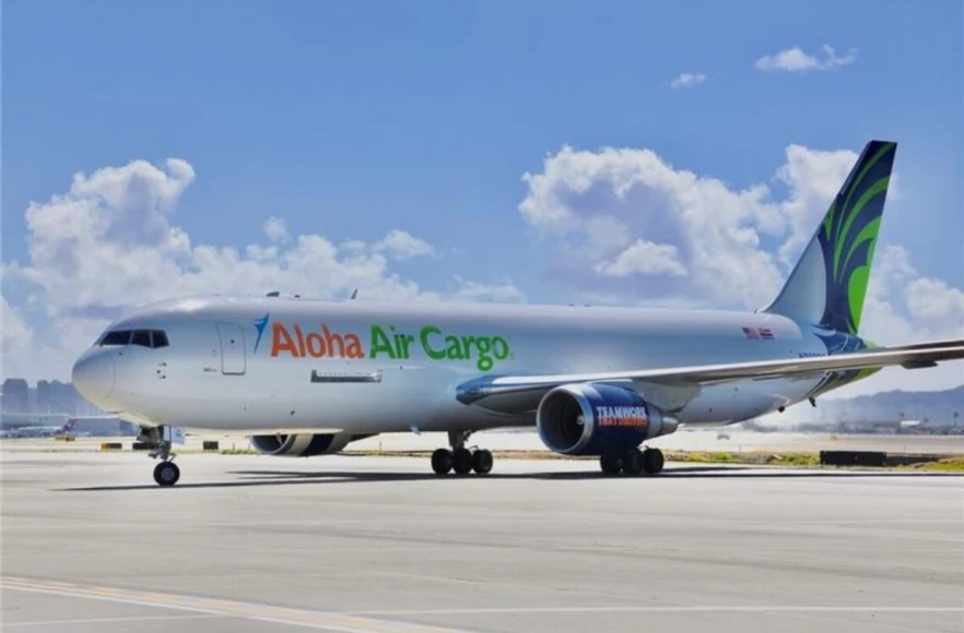 Photo of an Aloha Air Cargo plane sitting on the ramp in Hawaii.