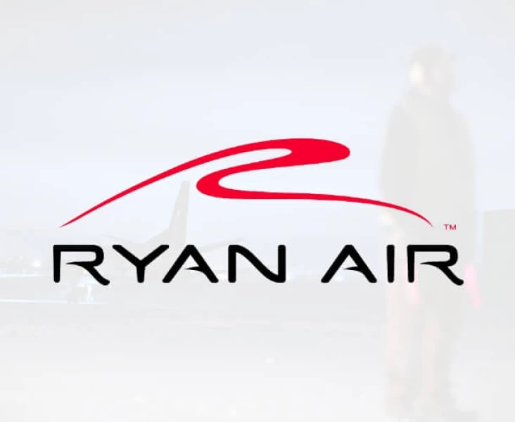 The trademarked Ryan Air logo with a photo of an employee in the background.