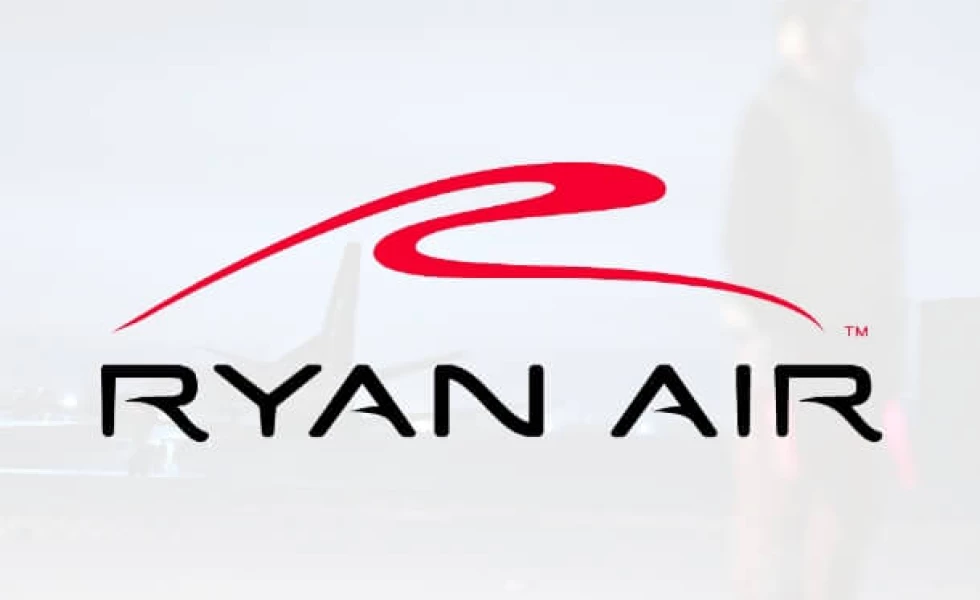 The trademarked Ryan Air logo with a photo of an employee in the background.