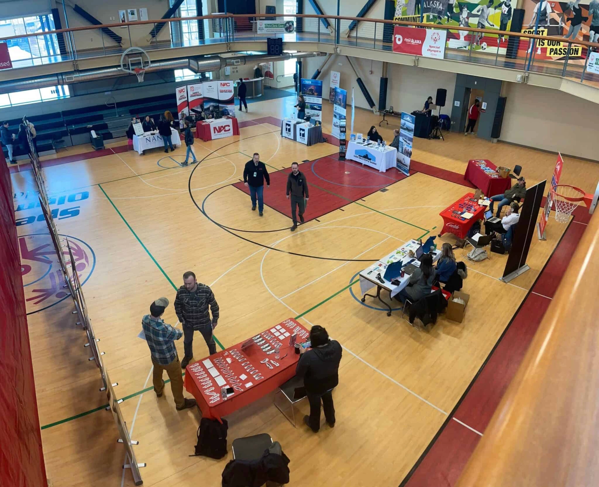 Photo of the Anchorage job fair in a local gymnasium.
