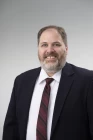 Corporate headshot of Eric Dance.